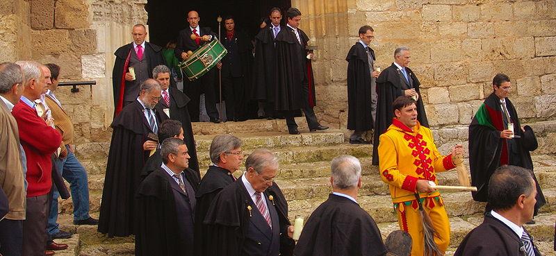 El Colacho and the Brotherhood in front of the church of Castrillo de Murcia