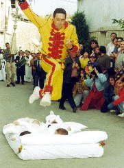 El Colacho in the middle of jumping over babies
