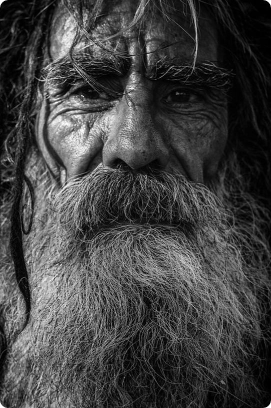 Black and white portrait of the bandit Herkko Rosvo-Ronkainen, hero of the founding legend of the Eukonkanto