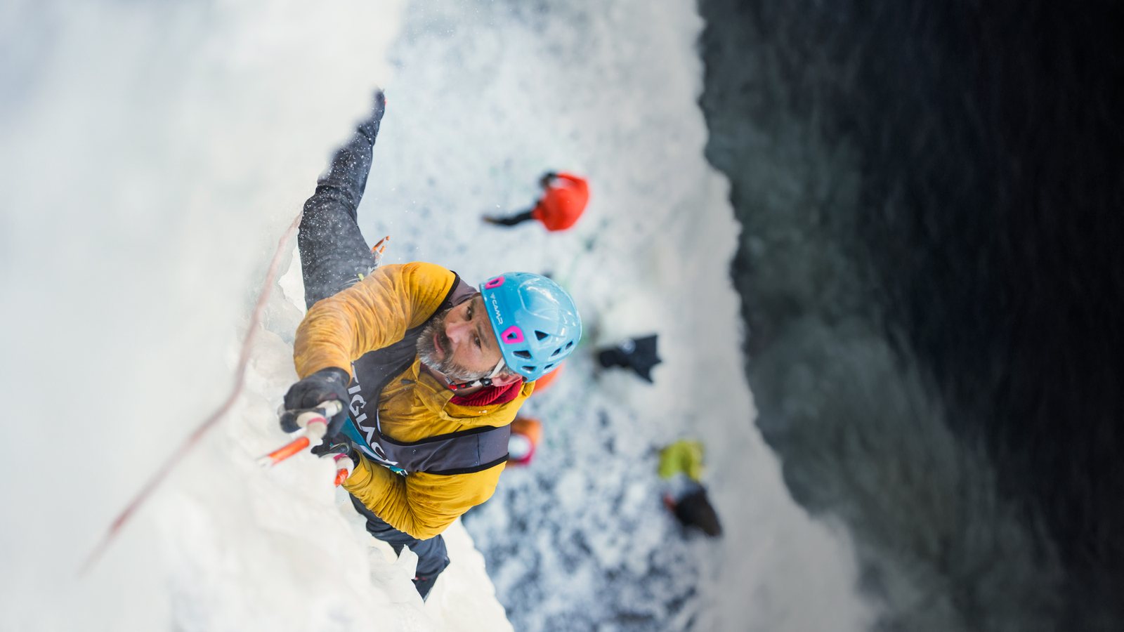 A climber on the ice wall of the Red Bridge Festiglace