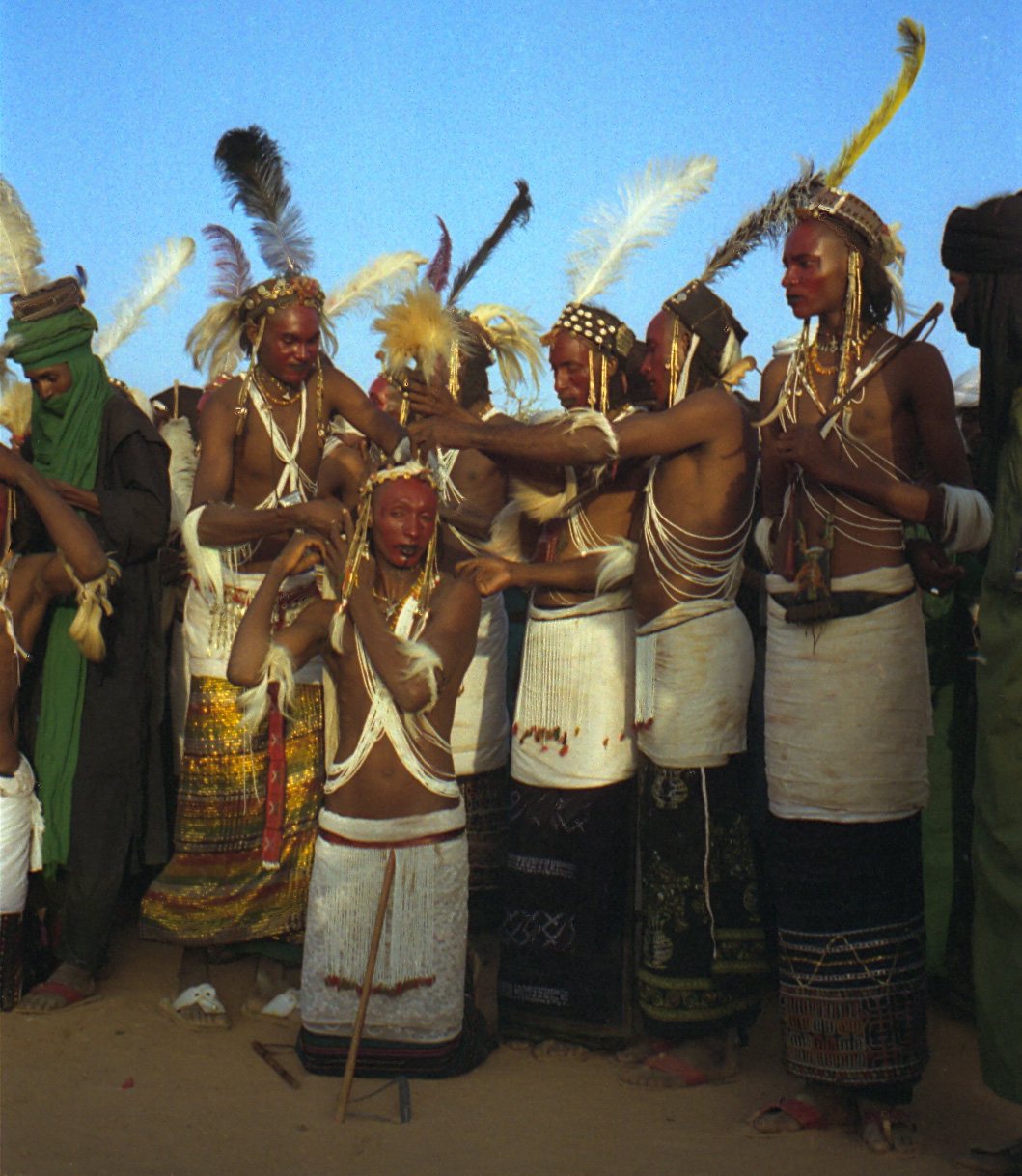 Candidates for Guérewol in full preparation, trimmings and feathers