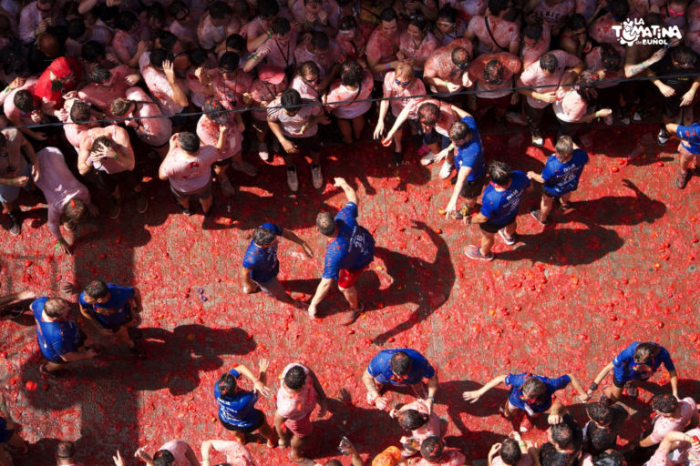 The street of Buñol becomes a red river of tomatoes