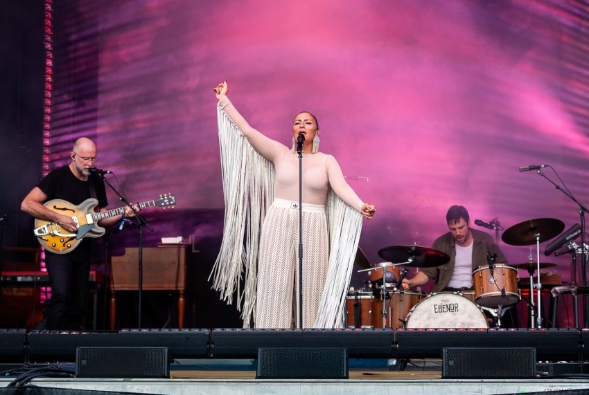 A singer on stage at the Mariposa Folk Festival