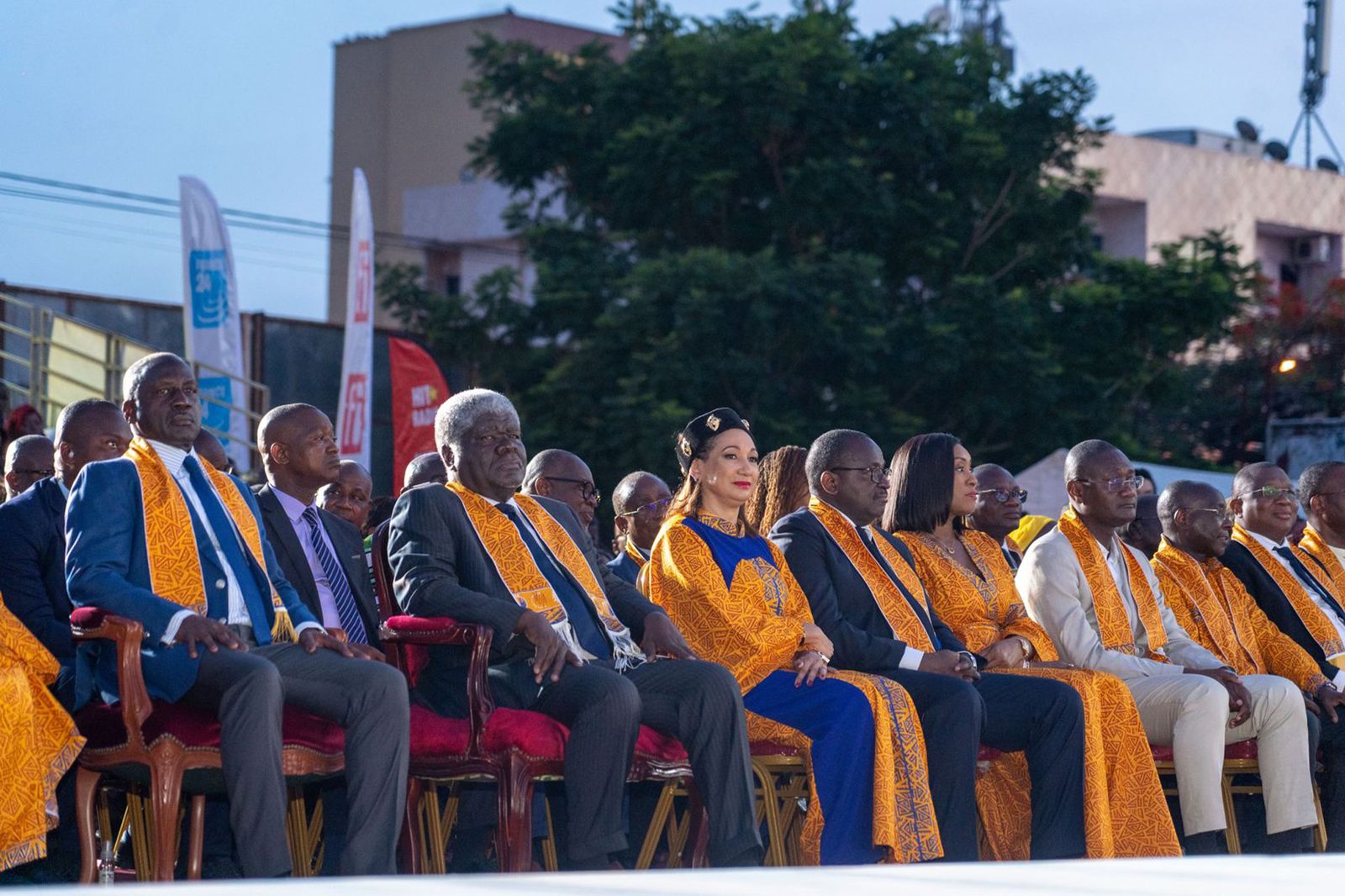 Ceremony at the MASA in Abidjan: officials in kente scarves