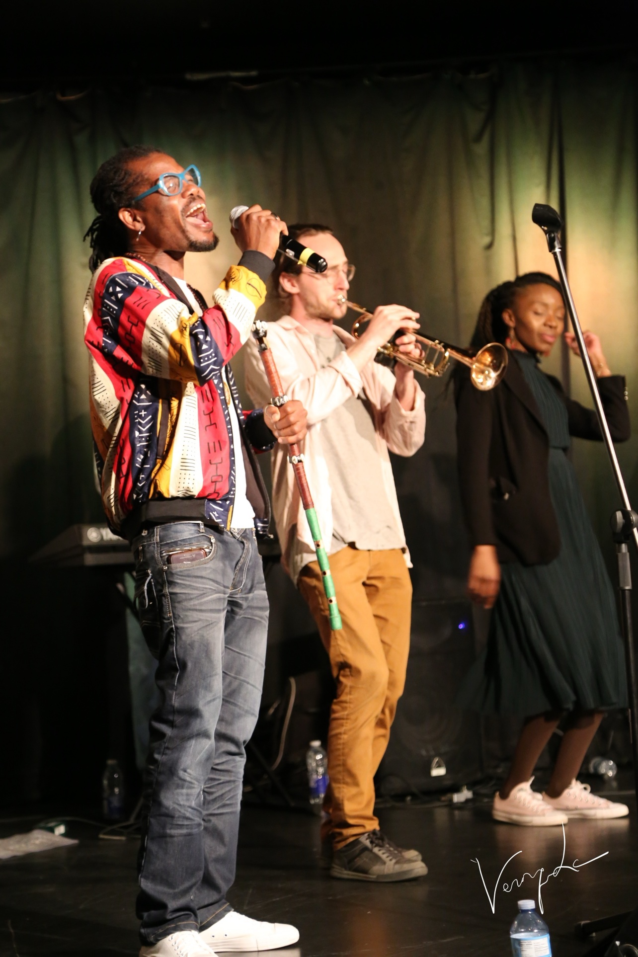 Flutist, trumpeter and singer on stage