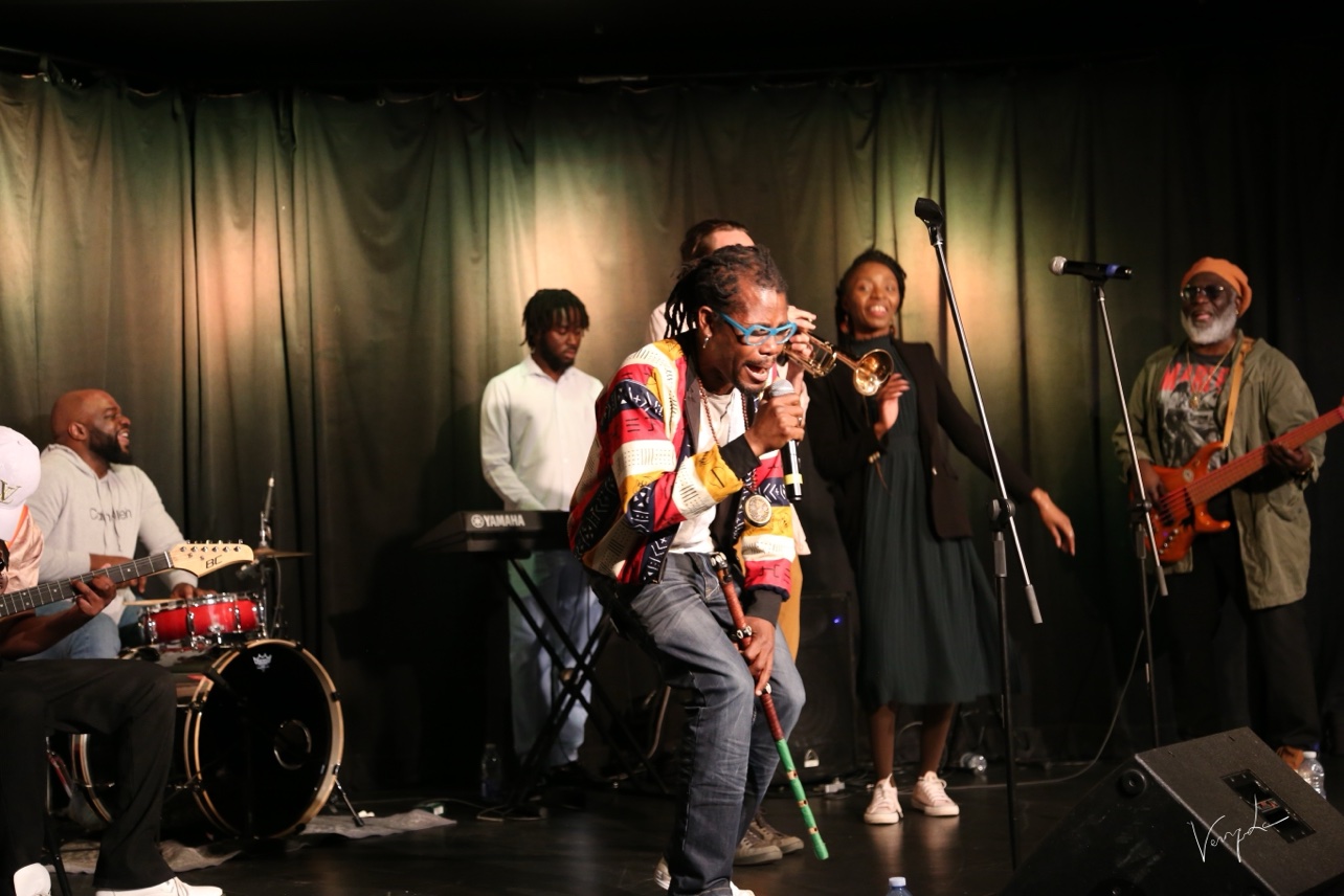 The entire group, wide view of the stage