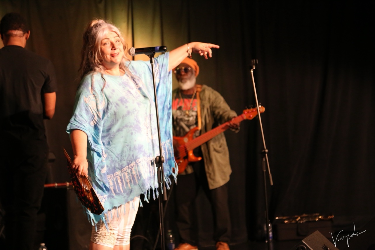 The singer in blue tunic