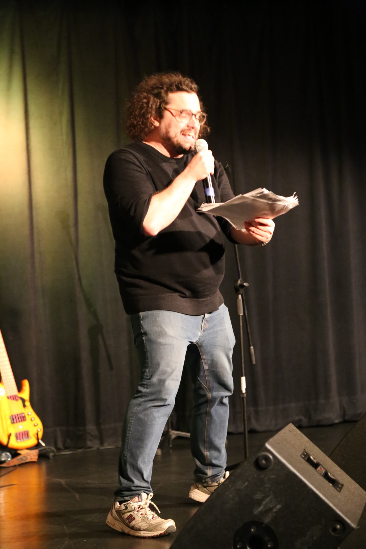 A spoken segment, mic in hand
